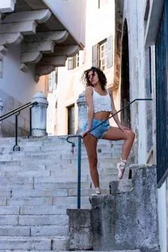 Young ballet dancer posing in the urban scenery of the city in Lisbon, Portug Stock Photos