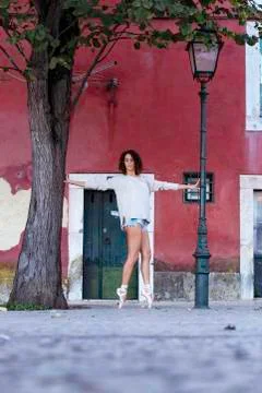 Young ballet dancer posing in the urban scenery of the city in Lisbon, Portug Stock Photos