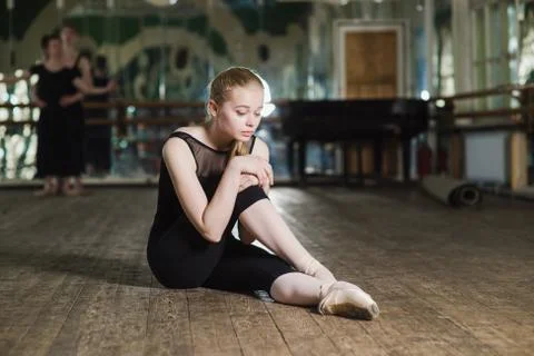Young ballet dancer practicing in class. Stock Photos