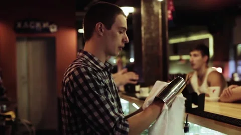 Young bartender working at the bar Stock Footage 65218191