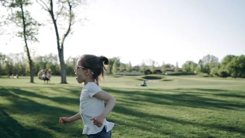 Young bautiful mother withe her cute little daughter are playing. Stock Footage 89967175