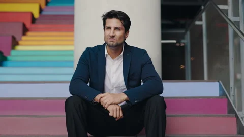 Young Bearded Businessman Has Problems in the Family, Divorced His Wife, Sits on Stock Footage 303147846