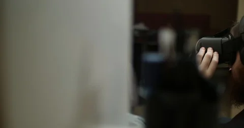 A young bearded engineer uses virtual reality glasses Stock Footage 88059346