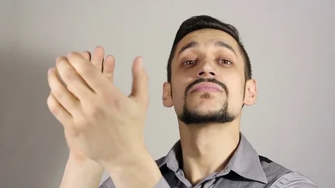 Young bearded man applauding. Stock Footage 75351781