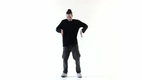 Young bearded man dances hip-hop isolated on white background Stock Footage 275547150
