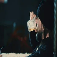 Young Bearded Man Drink Alcohol At Bar Hd Slow Motion Video. Guy Hat Whiskey Stock Footage