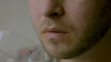 A young bearded man drinks a cola, close-up, slow motion Stock Footage 85689397