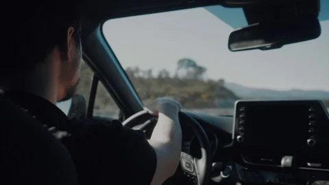 Young bearded man driving car. Stock Footage 129501796