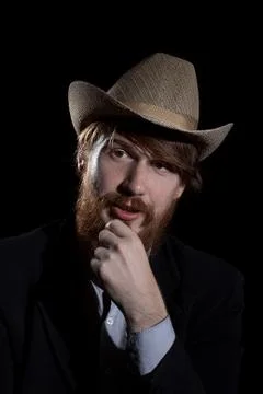 Young bearded man in a hat Stock Photos