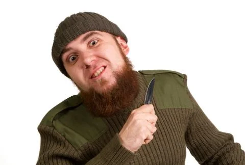 A young bearded man with a knife Foto stock