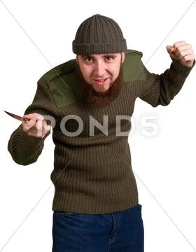 Young bearded man with a knife Stock Photos