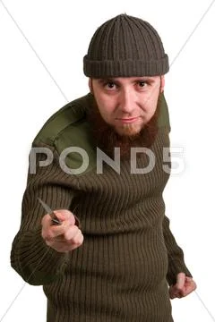 Young bearded man with a knife Stock Photos