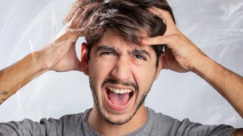 Young bearded man making different funny faces in Stop motion Stock Footage 103296437