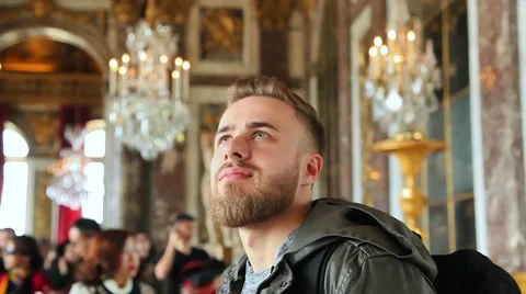 Young, bearded man in the museum. Versailles palace. Stock Footage