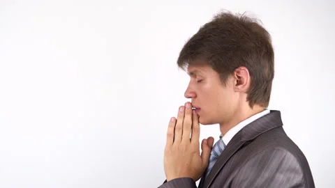 Young bearded man praying, asking God for help. Stock Footage 92769953