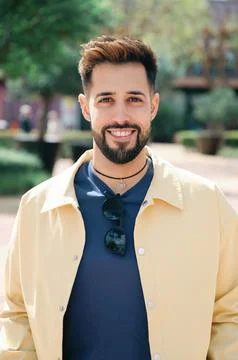 Young bearded man smiling at the camera 库存照片