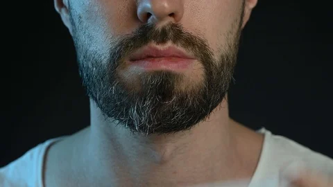A young bearded man wearing protective mask Stock Footage 126774850
