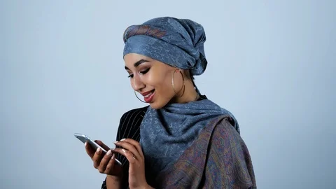 Young beautiful arabic woman reading something touching and pathetic in her Stock Footage 113686738