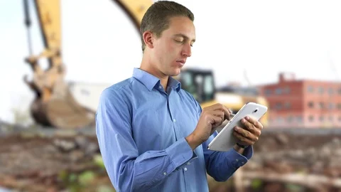 Young Beautiful Architect Working on a Tablet in a Building Site Stock Footage 107792939