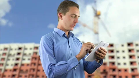 Young Beautiful Architect Working on a Tablet in a Building Site Stock Footage 107793060