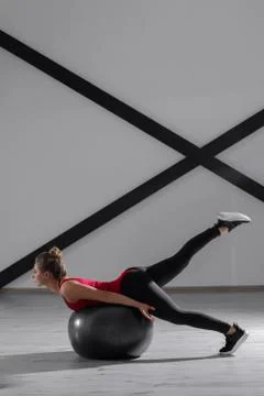 Young beautiful athlete is posing in studio Stock-Fotos