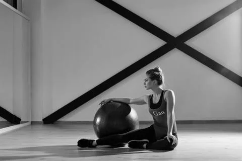 Young beautiful athlete is posing in studio Stock Photos