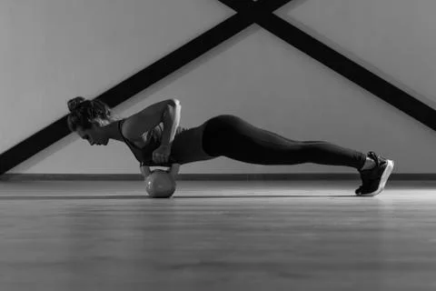 Young beautiful athlete is posing in studio Stock Photos