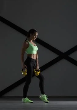 Young beautiful athlete is posing in studio Stock Photos