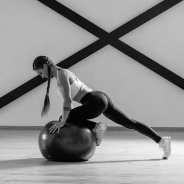 Young beautiful athlete is posing in studio Stock-Fotos