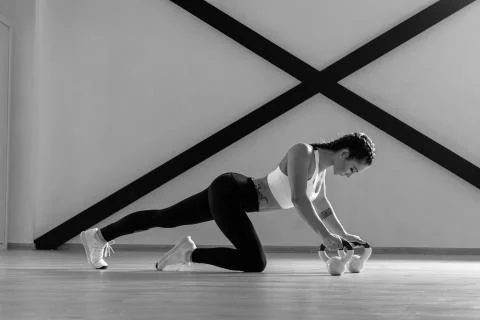 Young beautiful athlete is posing in studio Stock Photos