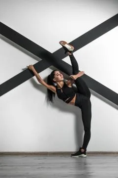Young beautiful athlete is posing in studio Stock Photos