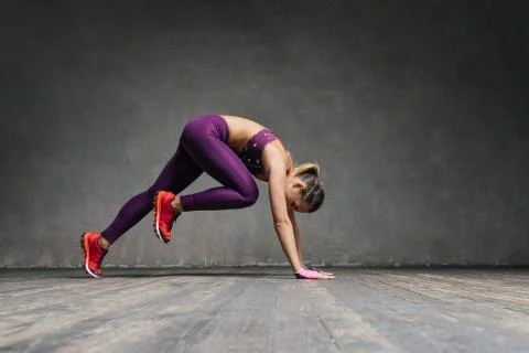 Young beautiful athlete is posing in studio Stock-Fotos