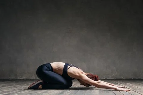 Young beautiful athlete is posing in studio Stock Photos