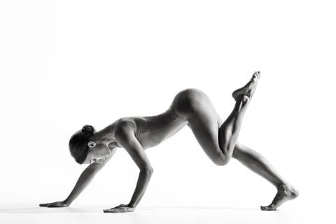 Young beautiful athlete is posing in studio Stock-Fotos