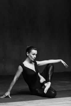 Young beautiful athlete is posing in studio Stock-Fotos