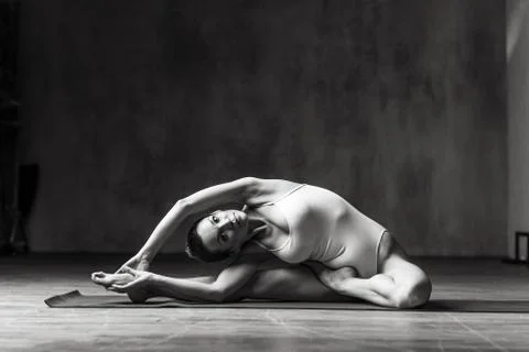 Young beautiful athlete is posing in studio Stock Photos
