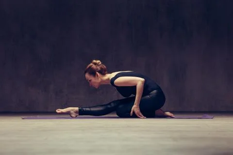 Young beautiful athlete is posing in studio Stock Photos