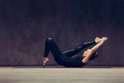 Young beautiful athlete is posing in studio Stock Photos