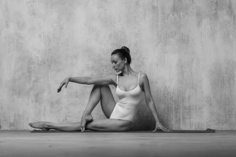 Young beautiful athlete is posing in studio Stock Photos