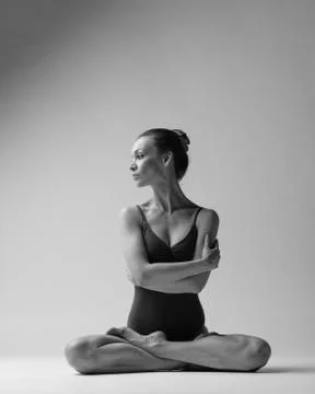 Young beautiful athlete is posing in studio Stock Photos