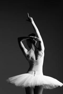 Young beautiful ballerina is posing in studio Stock Photos