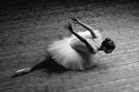 Young beautiful ballerina is posing in studio Stock Photos