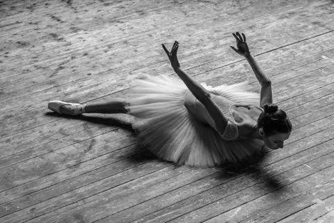 Young beautiful ballerina is posing in studio Stock-Fotos