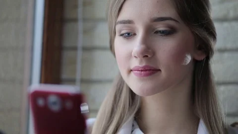 Young beautiful blonde start-upper sits in the modern office by the window Video stock 73186378