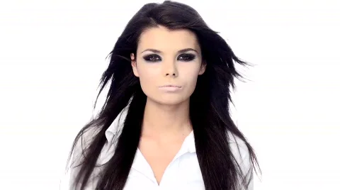 Young beautiful brunette with black scary makeup Stock Footage