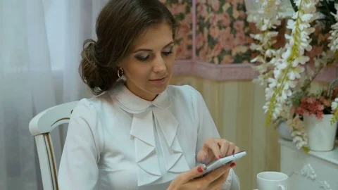 Young beautiful businesswoman in white clothes. Stock Footage