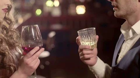 Young Beautiful Couple Spending Evening at the Bar Stock Footage 62898909