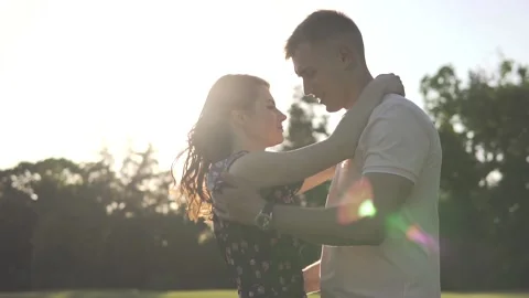 Young beautiful couple on sunset background Stock-Footage 112247811