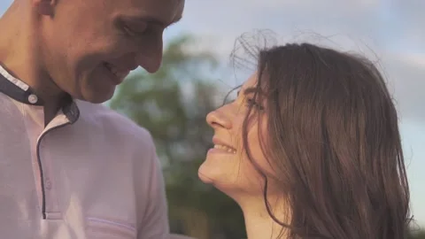 Young beautiful couple on sunset background Stock-Footage 112247937