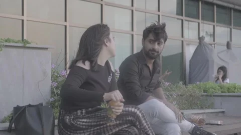 A young, beautiful couple is talking in Karachi, Pakistan Stock Footage 343874716